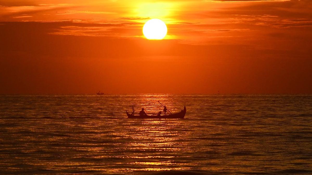 Slot dengan latar langit jingga tak berujung